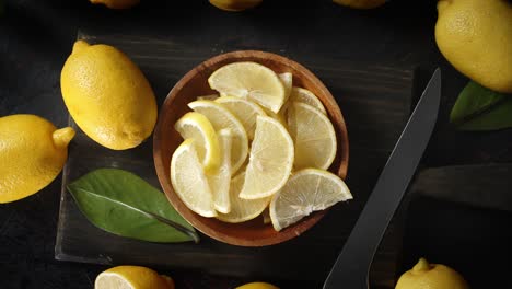 sliced fresh lemon on the plate slowly rotates.