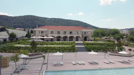 drone footage of the high-end villa that includes a pool in the city of ioannina, greece