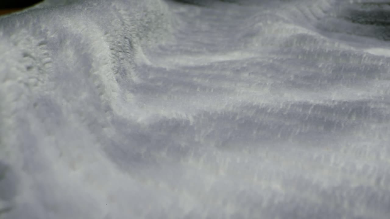 Closeup of an expertly tailored suit that beautifully showcases its sophisticated buttons and fine fabric texture