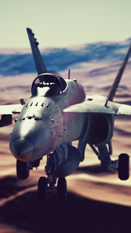 f/a-18 super hornet fighter jet taking off in the desert