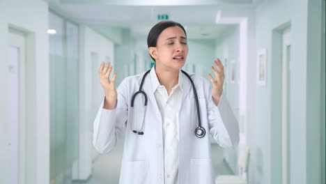 stressed and tensed indian female doctor