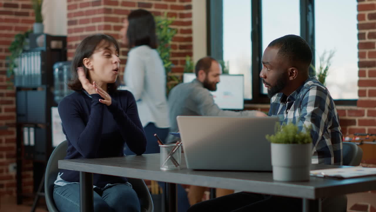 African american man greeting female applicant at hiring meeting