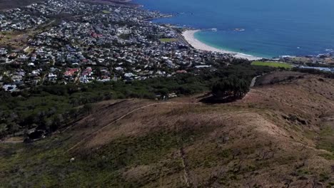 Aerial-Reveling-Shot-of-Cape-Town-Beach-Viewed-from-Lion's-Hed-South-Africa