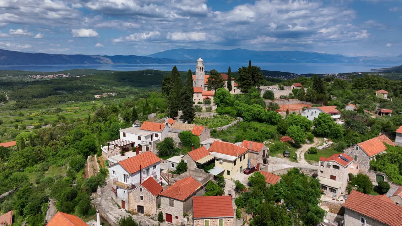 Hvar Croatian town and cathedral. Aerial dolly out