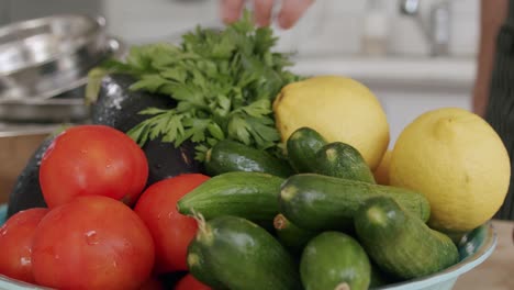 chef putting a tomato in a vegetable bowl
shot at 100fps 2