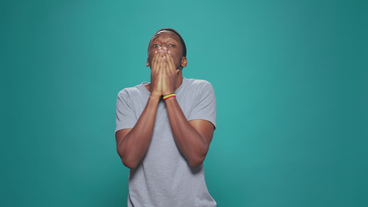 Shocked amazed man having surprised reaction after hearing rumor