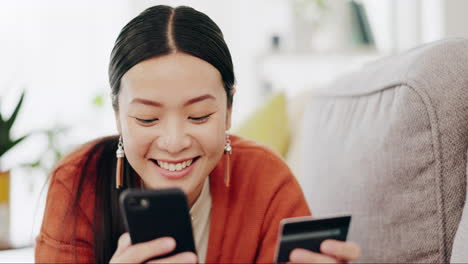 asian woman, credit card and phone relaxing