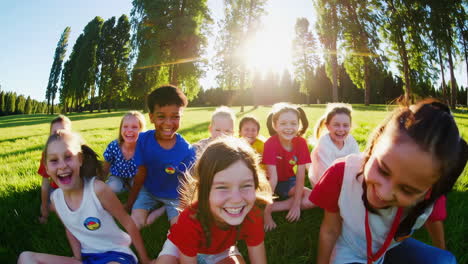 happy children playing and laughing in a sunny park