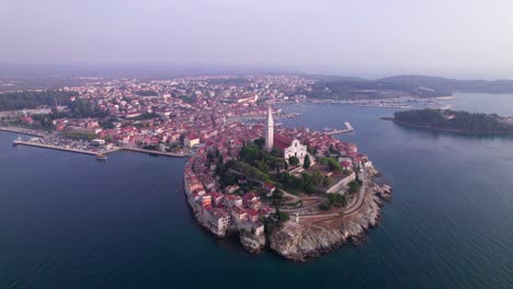 Afternoon-sunlight-shining-on-ancient-mediterranean-coast-town-Rovinj