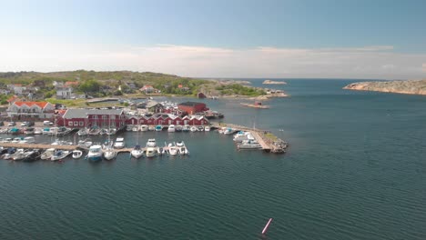 drone flying towards small harbour in sweden, gothenburg