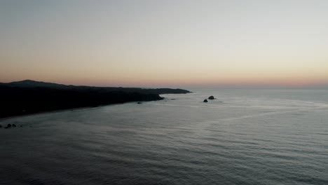 aerial shot of sunset at oaxacan coast, mazunte oaxaca, mexico