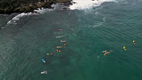 surfers waiting for the waves, carrizalillo beach, oaxaca