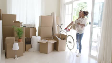 ecstatic young couple celebrating their new home