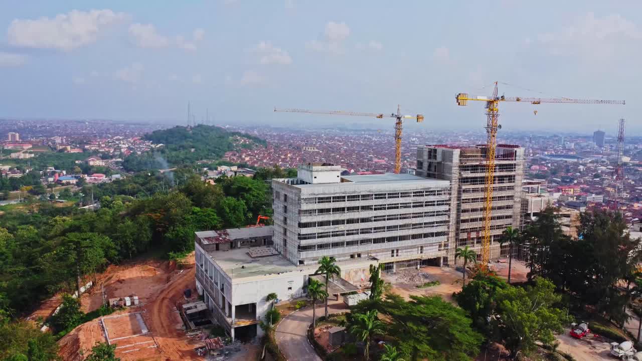 Jib up of the luxurious Premier hotel with the city of Ibadan in the background on a sunny day in Nigeria, Africa