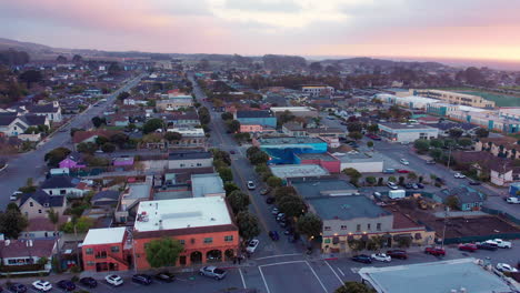 Aerial-footage-above-downtown-half-moon-bay-california-at-sunset