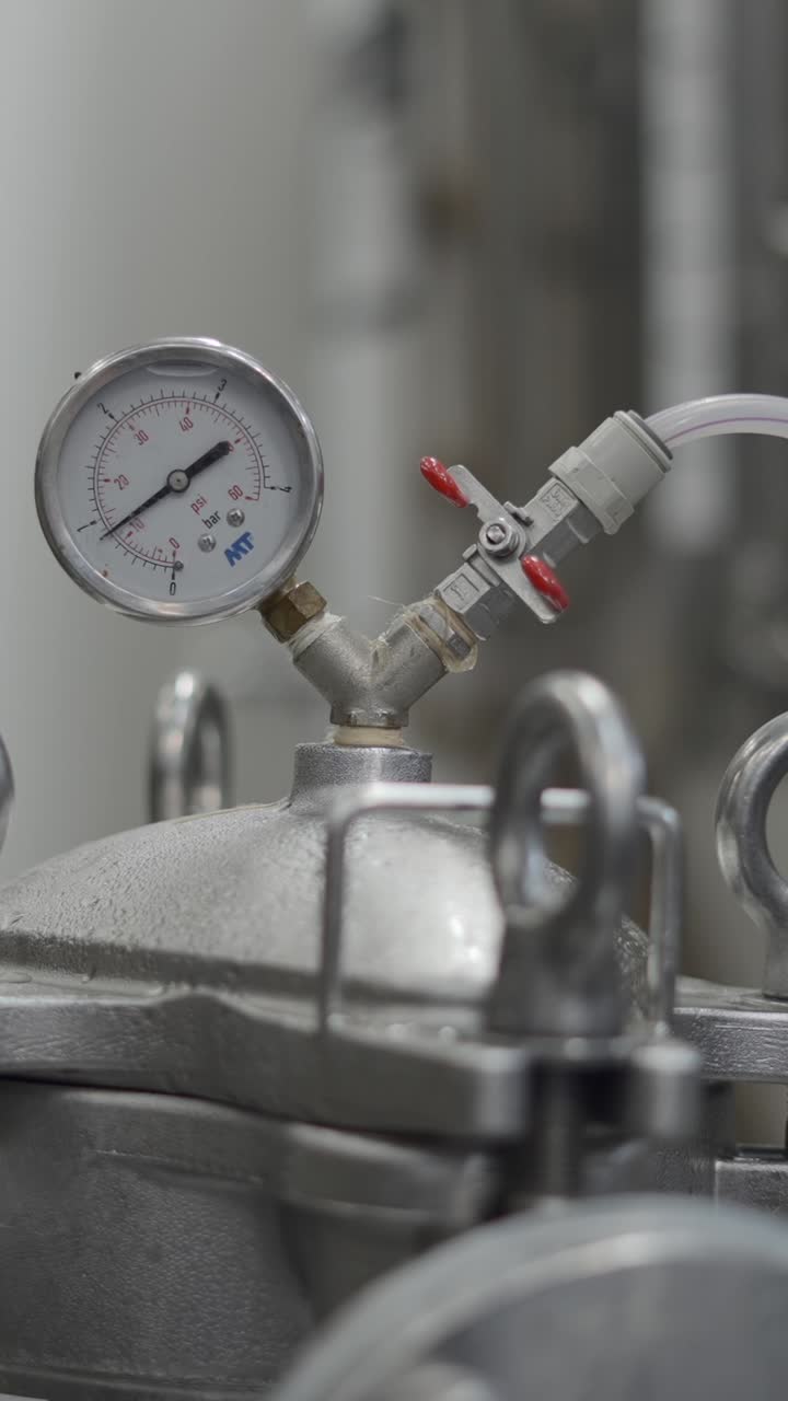 Close-up of an Industrial Pressure Gauge on Equipment