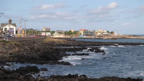 Summer-sun-shining-on-ocean-and-coast-of-Jeju-island-in-South-Korea