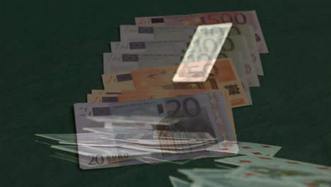 spielkarten und banknoten, die auf den kartentisch geworfen werden