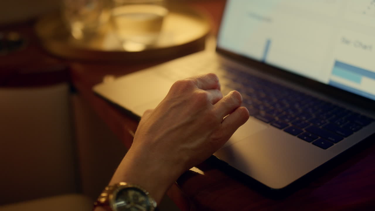 Closeup hands browsing touchpad. Manager checking project on laptop screen.