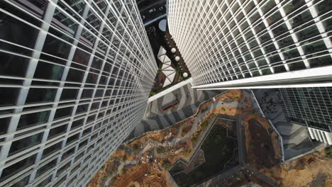 Falling-from-a-tall-office-building-in-slow-motion-while-rotationing