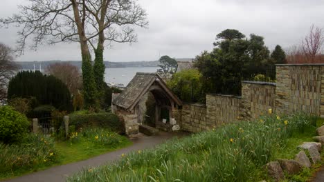 mid shot of graveyard entrance at saint mylor church