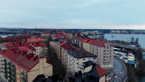 urban area on island stora essingen in stockholm sweden in orbiting drone shot