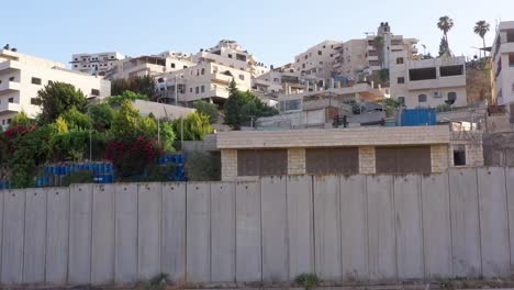 palestine anata refugges camp behind concrete wall -aerial