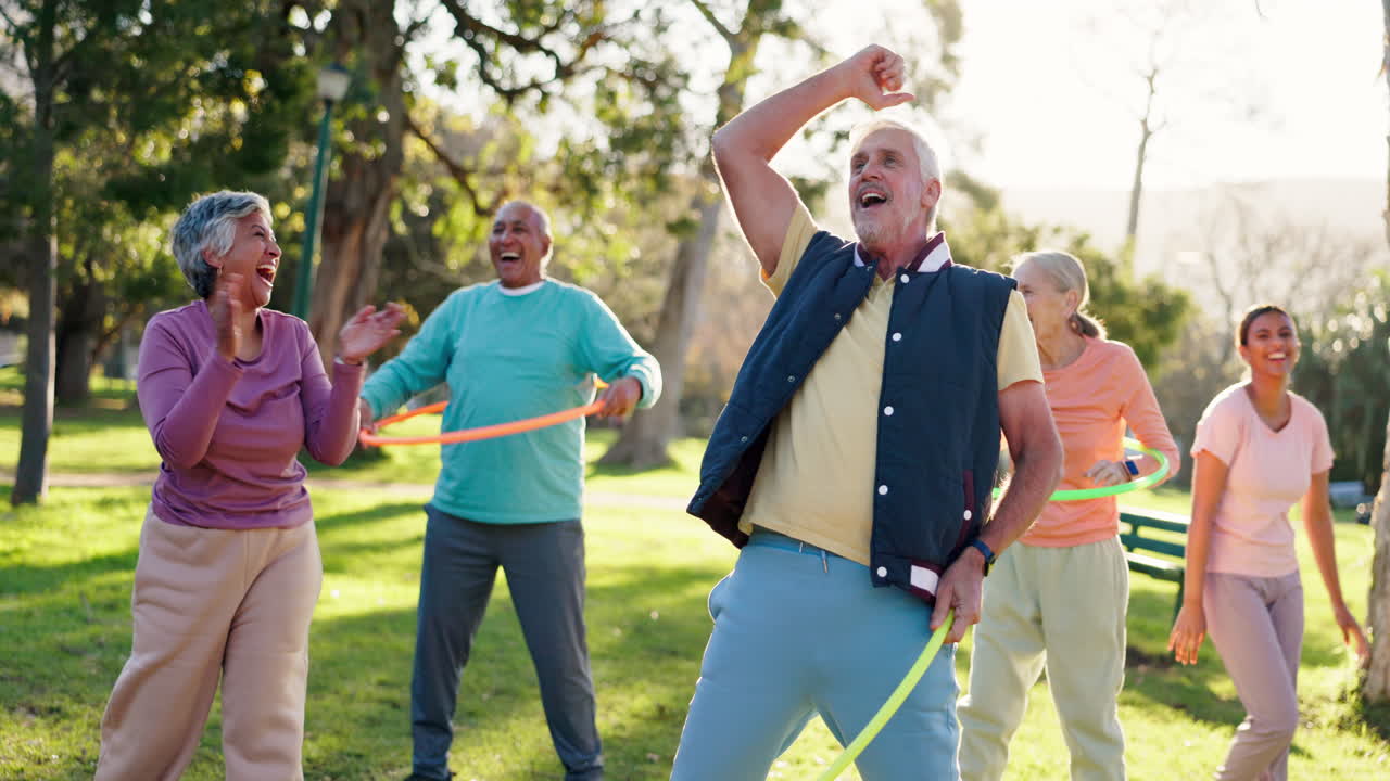 Active Seniors Hula Hooping in the Park