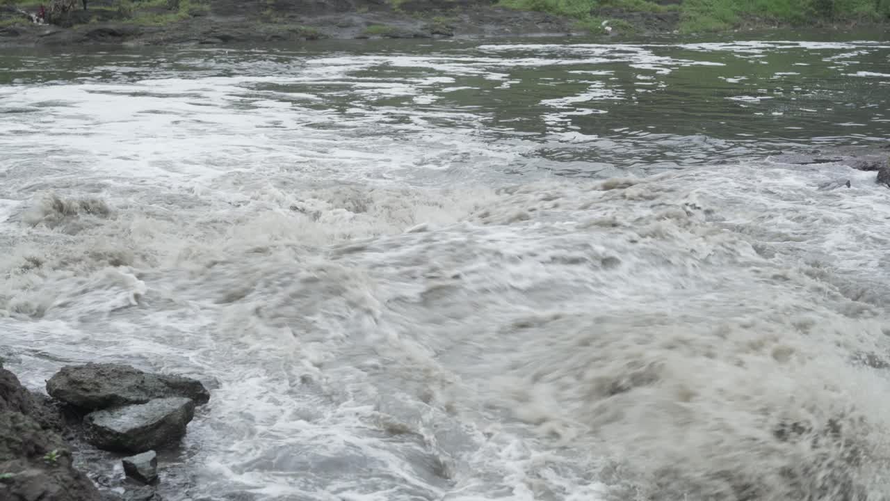 Untreated industrial and municipal waste sewage water mixes with river water, leading to formation of toxic foam pollutants, Godavari River, Nashik, Maharashtra