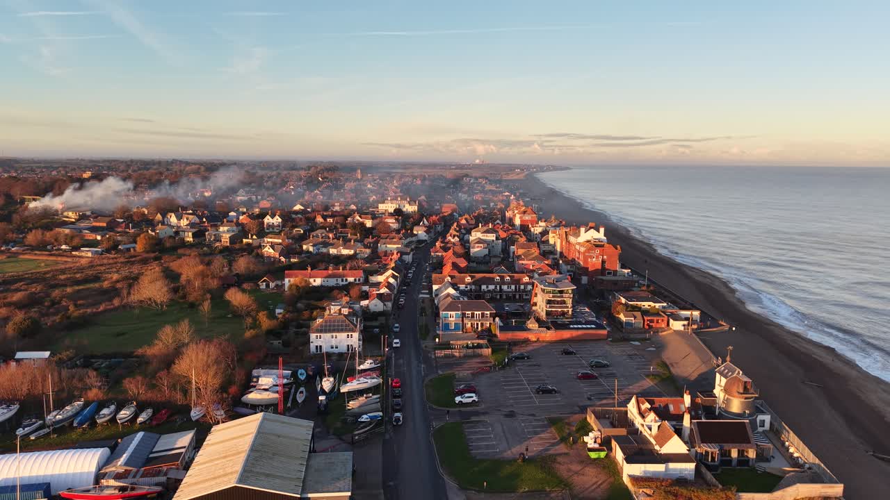 Aldeburgh town centre Suffolk UK smoke drifting golden hour drone,aerial
