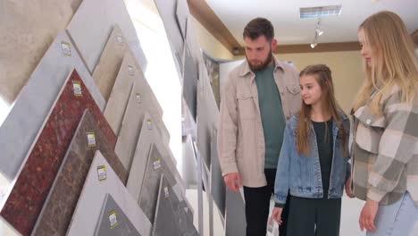 Family Choosing Tiles in Showroom