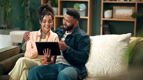 couple using tablet at home