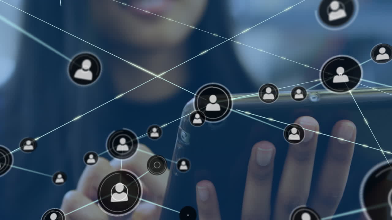 Animation of network of profile icons against mid section of a businesswoman using tablet at office