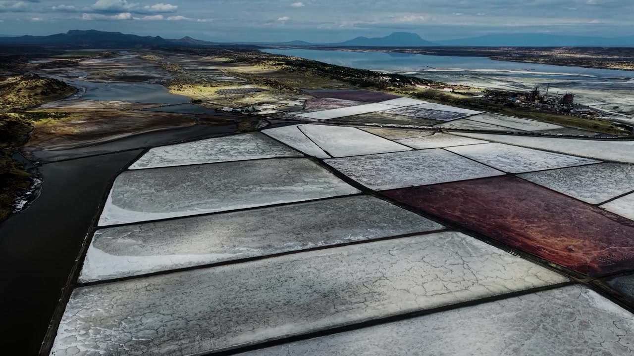 Lake Magadi kenya Sodaash Alkaline water salt lake Trona mineral deposits rift valley kenya . kenyan lake with Trona.