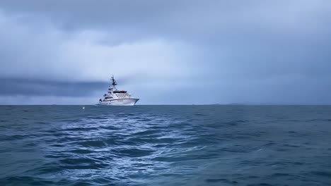 a ship sails through a thunderstorm