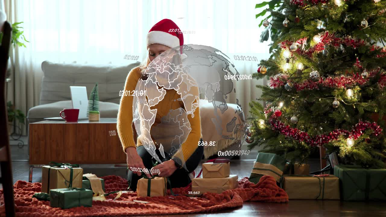 Woman kneeling tying ribbon globe appearing starting numeric overlay as placing gifts for marketing