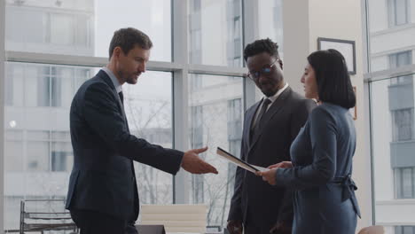 lawyers talking with client in the office