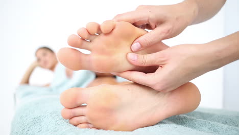 physiotherapist doing a foot massage