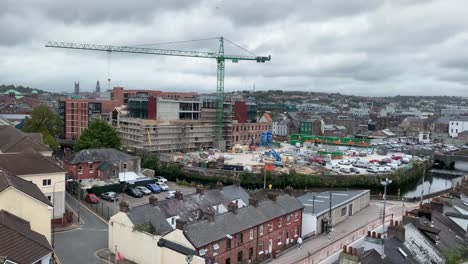 time lapse of a big building site with a crane