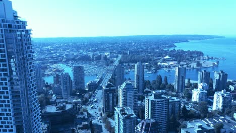 vancouver tallest residential building overlooking west end burrard street bridge kitsilano harbor science world grey west point ubc campus across english bay residential home towers and condos