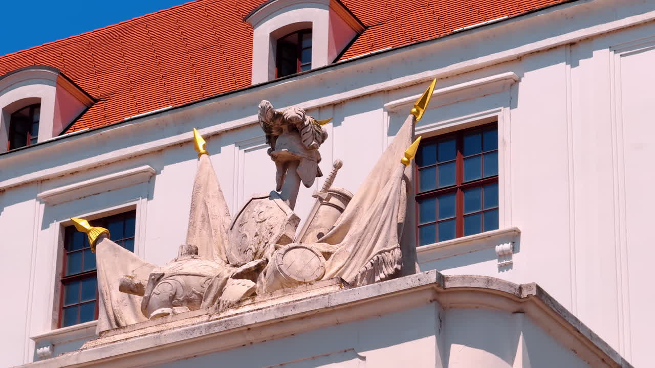 Bratislava, Slovakia, 2 June 2025: An architectural sculpture that adorns the façade of a building. Relief composition element of a cornice or front of Bratislava Castle in Slovakia