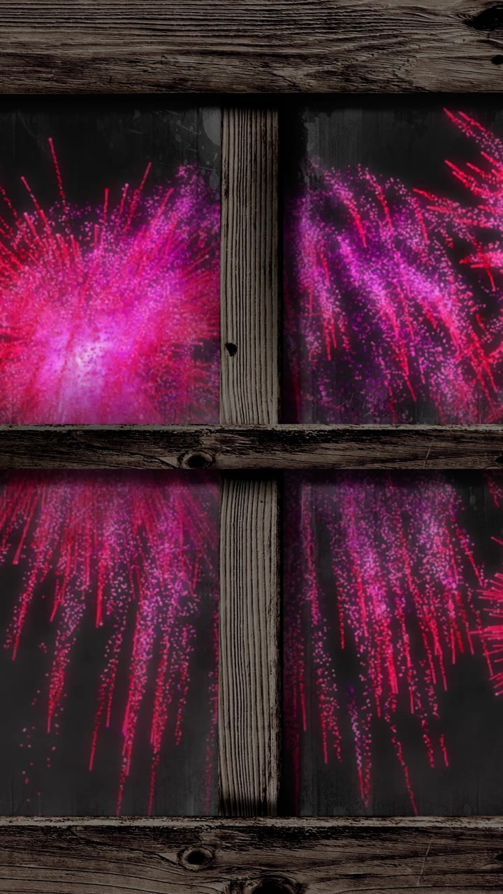 Animazione di una finestra con fuochi d'artificio rosa di Natale e Capodanno nel cielo notturno