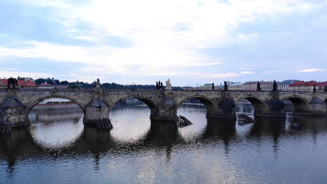 Aerial-view-to-Vltava-river-and-Charles-Bridge,-Prague,-Czech-Republic