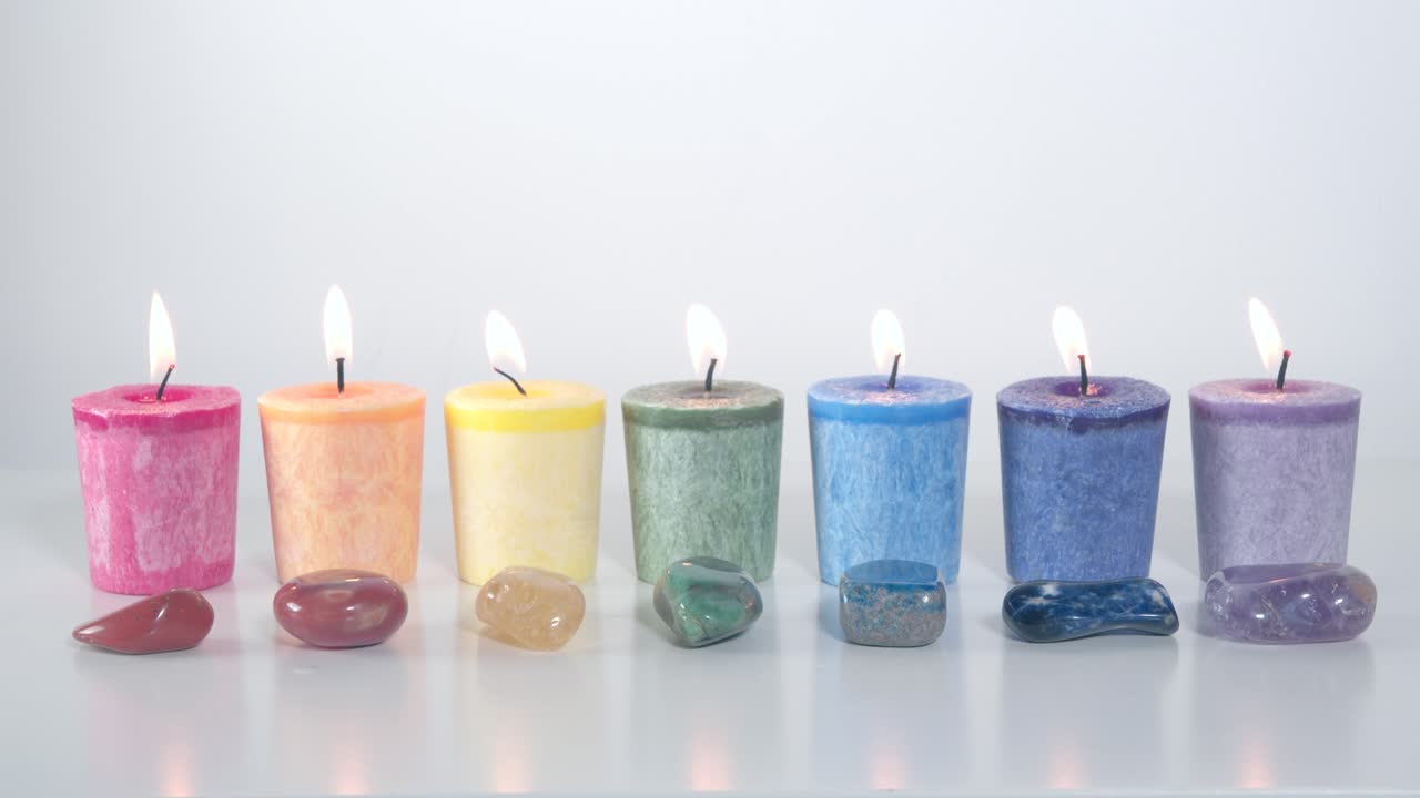 Blowing out the seven chakra system candles