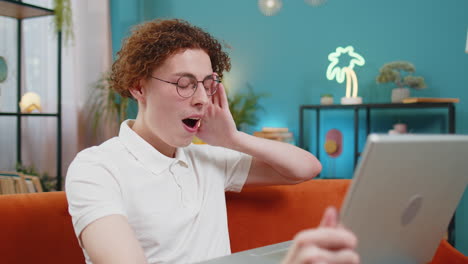 surprised man using laptop computer receive mail good news message wow shocked by sudden victory win