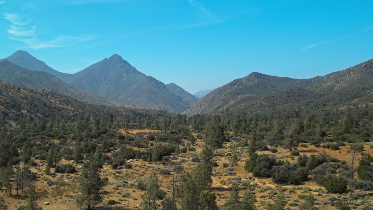 Aerial view of the trees and mountains that surround Kernville.