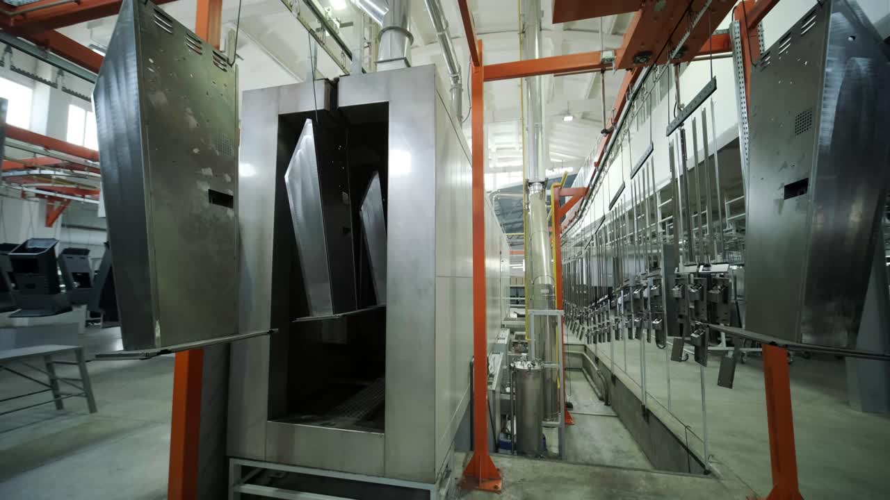 Metal Parts Painting Process in a Factory