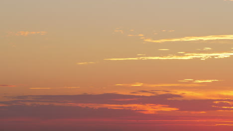 Flying-airplane-in-the-evening-sky