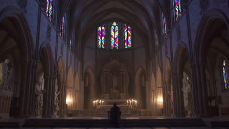 praying in a dark church