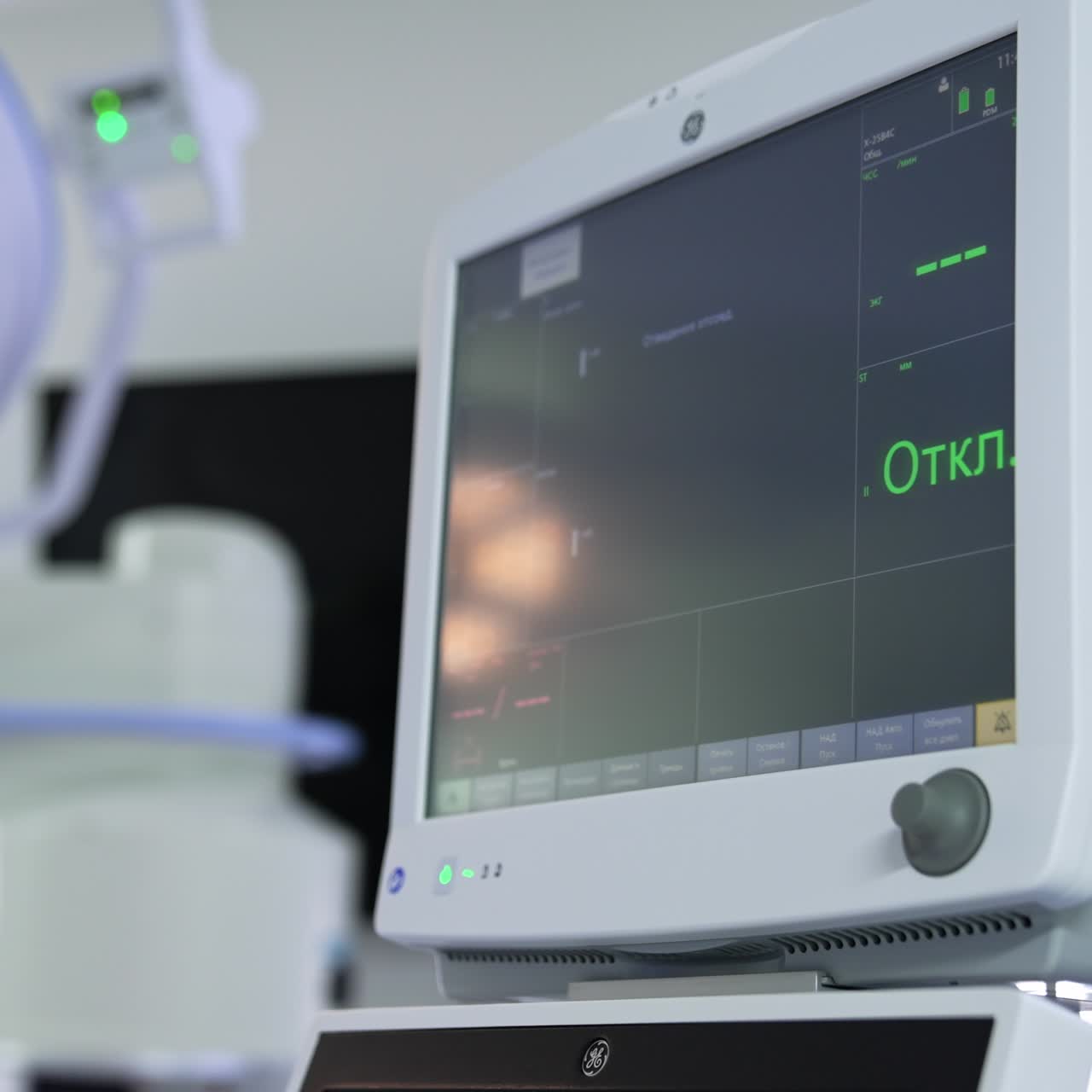 Switched on black screen from a modern lung ventilator machine. Hand of doctor pointing at the monitor not connected to the patient yet
